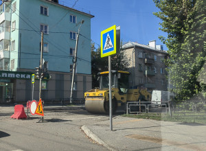 Второй слой асфальтового покр...